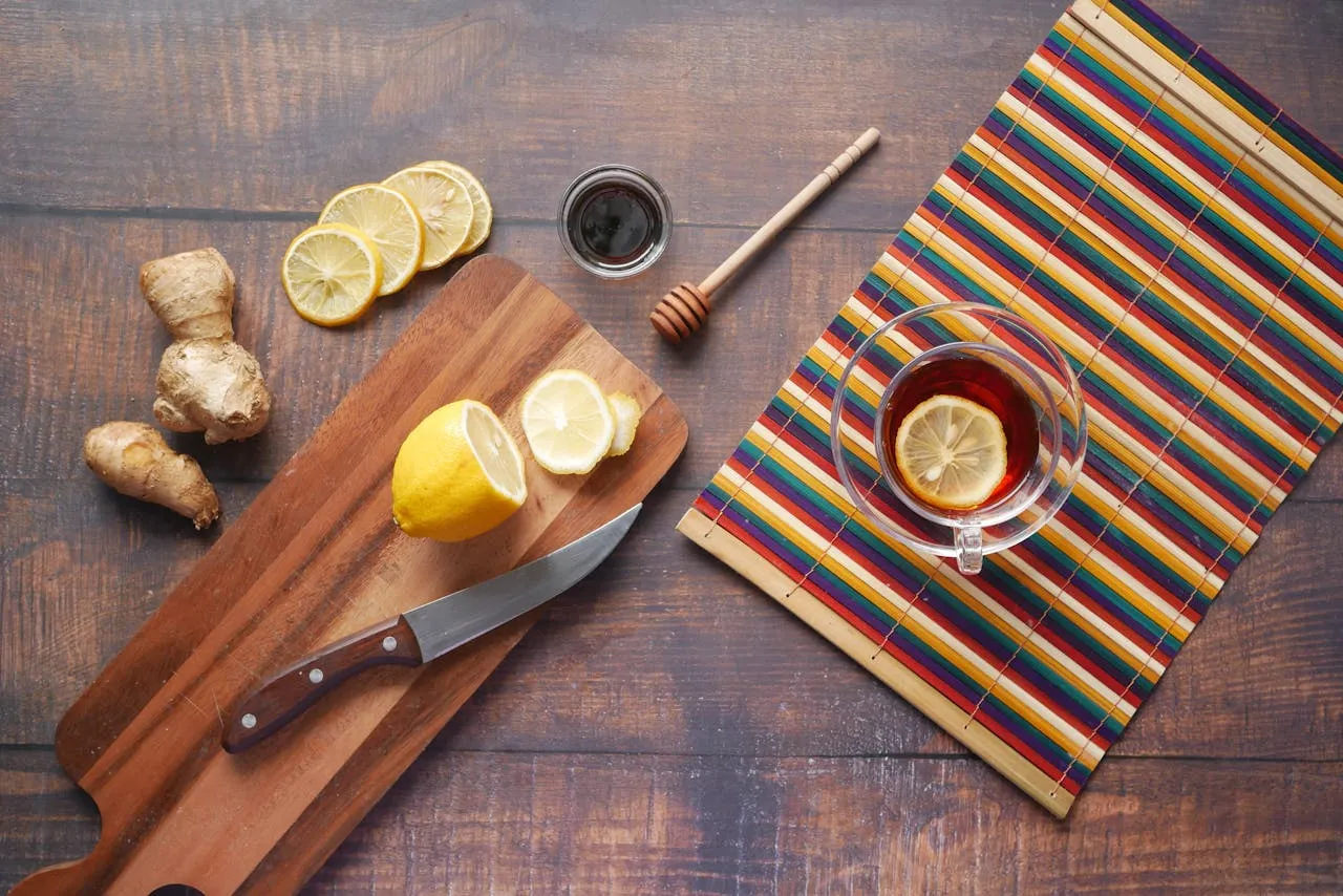 Herbal tea and natural ingredients on a wooden surface